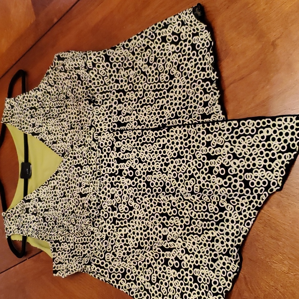J.T.B Asymmetrical Top